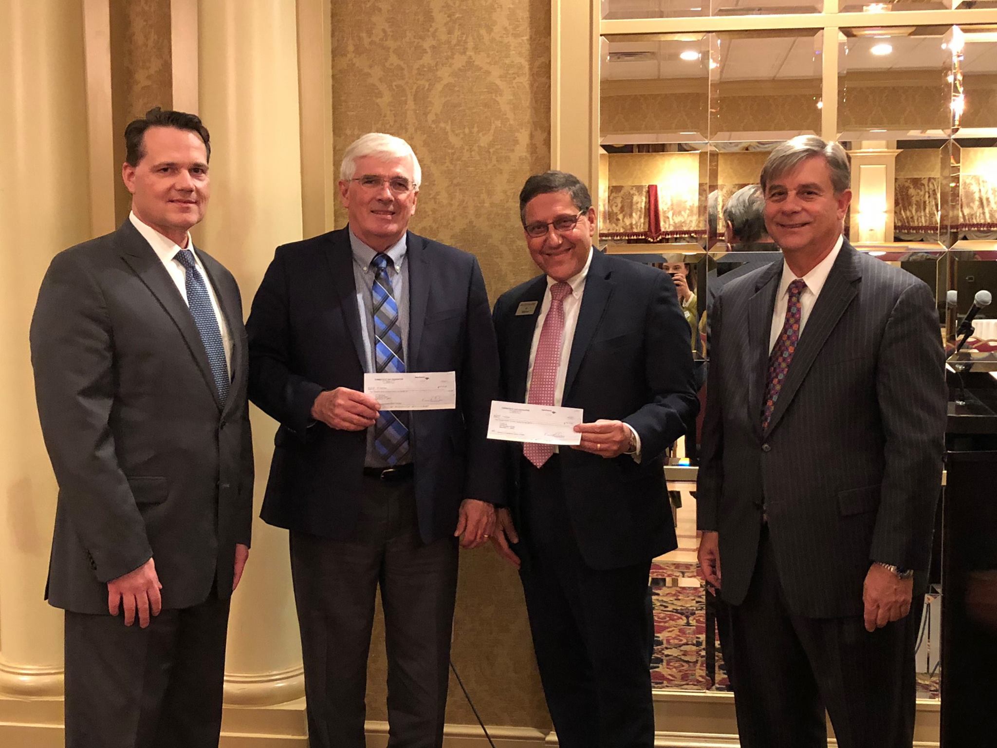 (L to R) Workers’ Compensation Section Chair Francis X. Drapeau, Connecticut Food Bank Chief Executive Officer Bernard J. Beaudreau, Foodshare Corporate and Community Giving Manager Al Marino, and Charity Golf Committee Chair Richard L. Aiken, Jr.