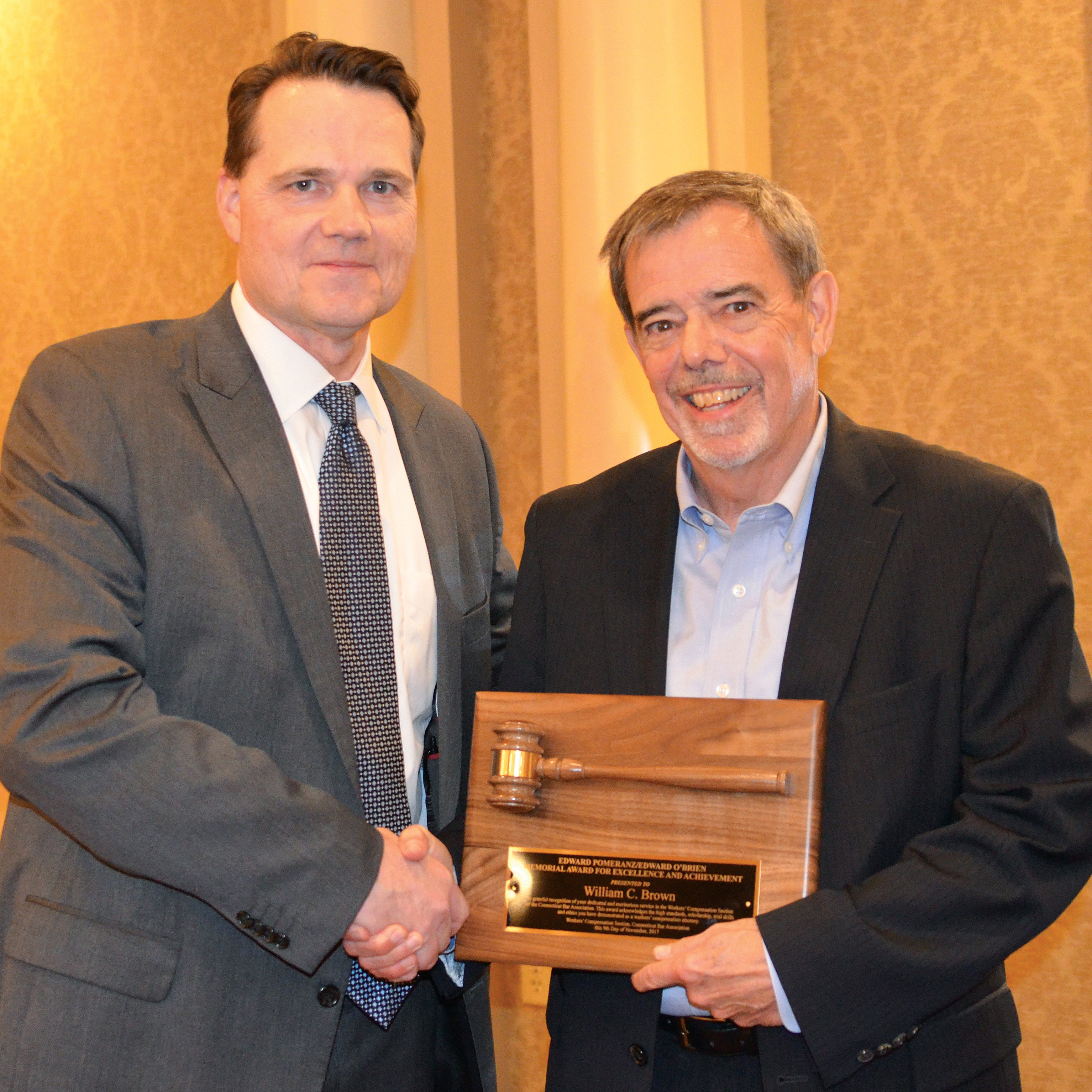 (L to R) CBA Workers’ Compensation Section Chair Francis X. Drapeau with the Pomeranz-O’Brien Award recipient William C. Brown.