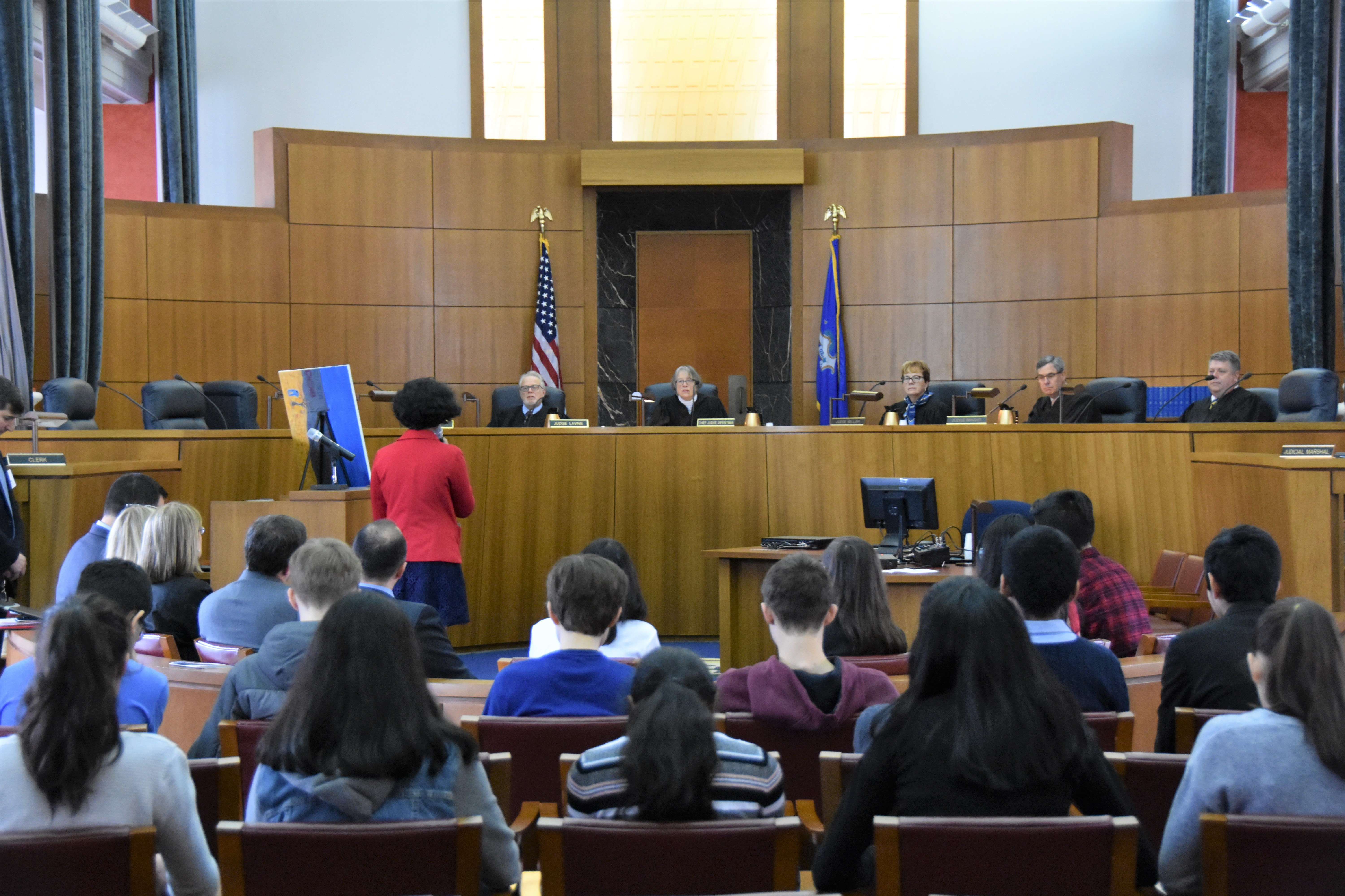 Valli Pendyala reading her poem to the Connecticut Appellate Court judges.